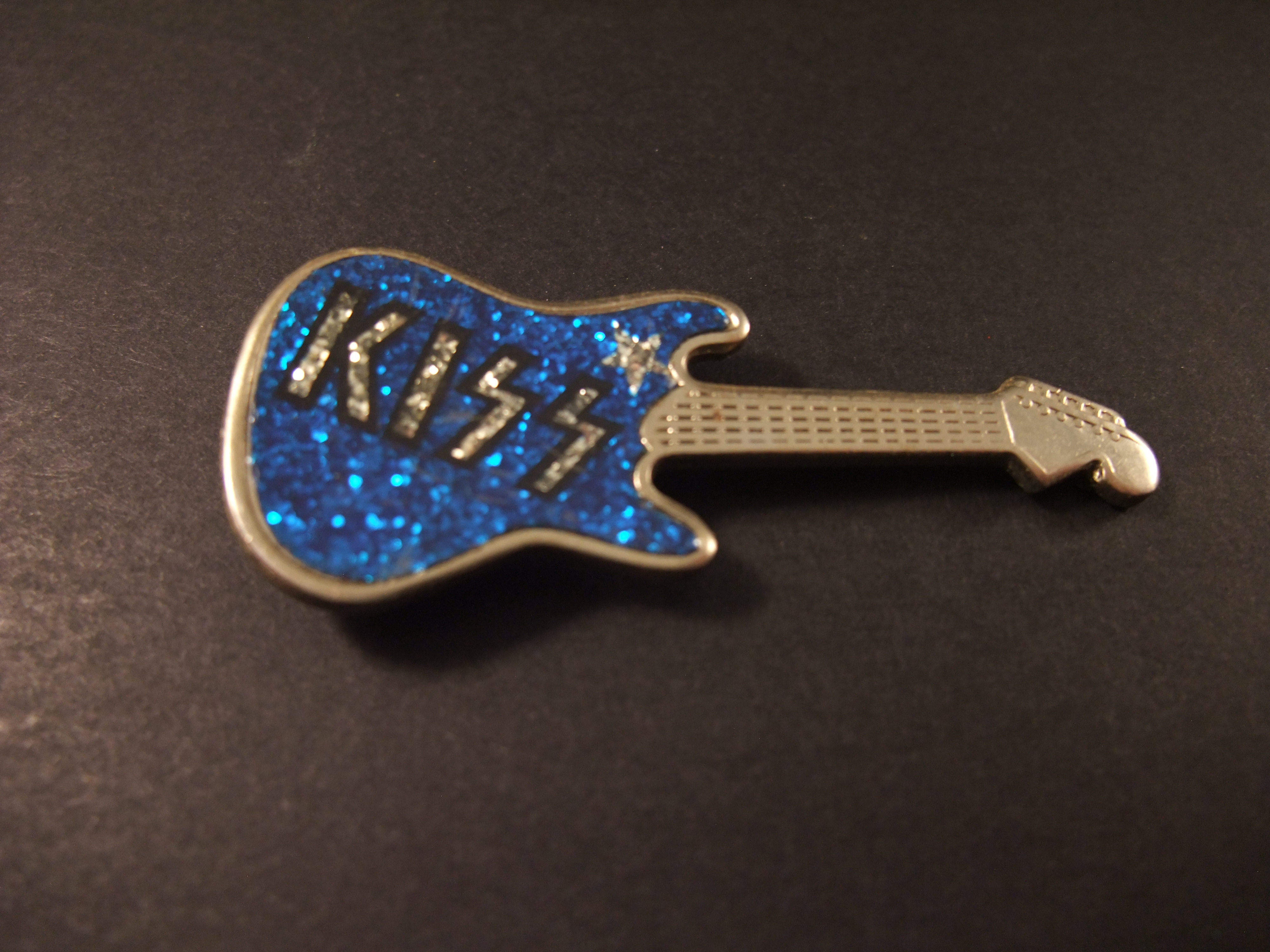 Kiss -hardrockband ( gitaar)